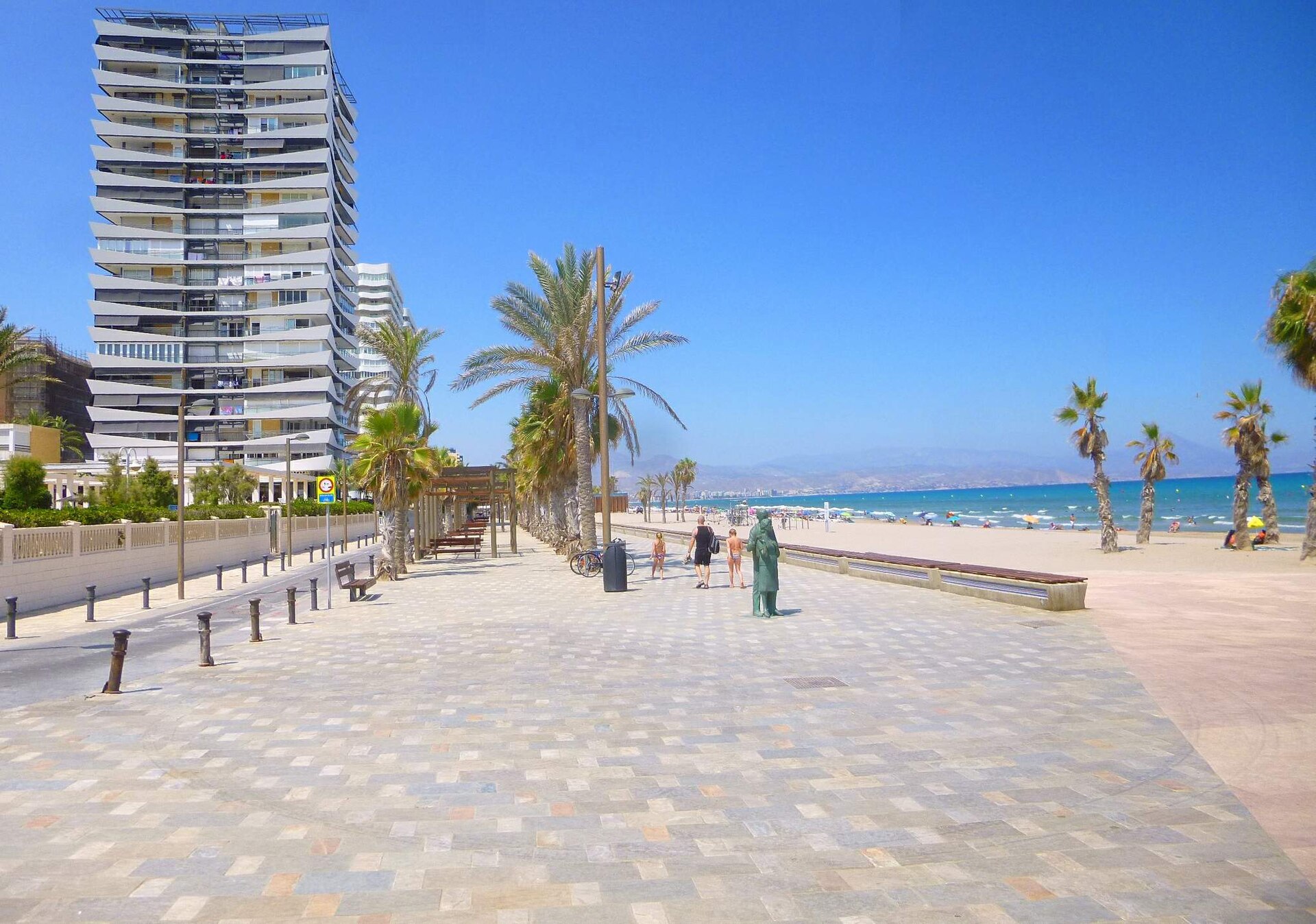 Playa de San Juan in Alicante, a wide sandy beach with families