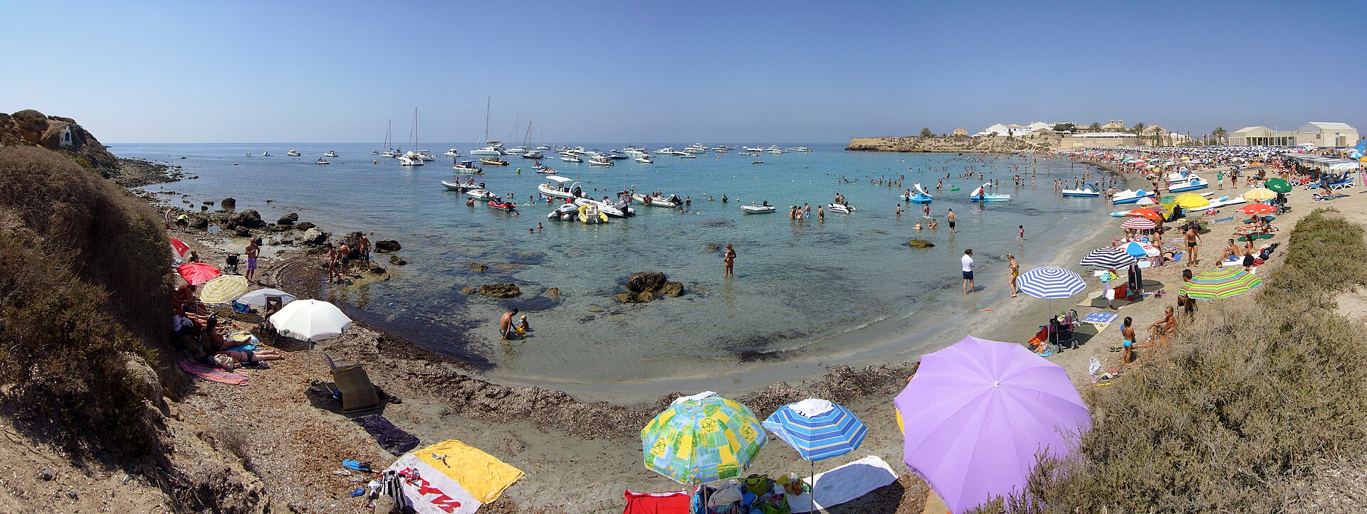 Clear shallow water at the main beach of Tabarca Island near Alicante